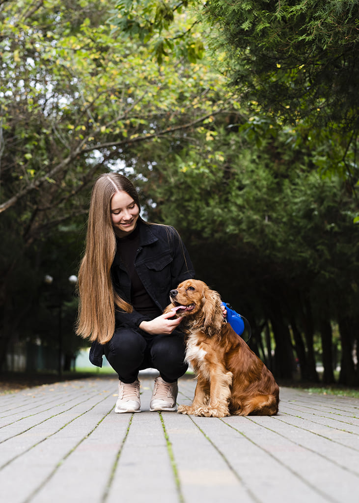 full-shot-young-woman-with-her-dog